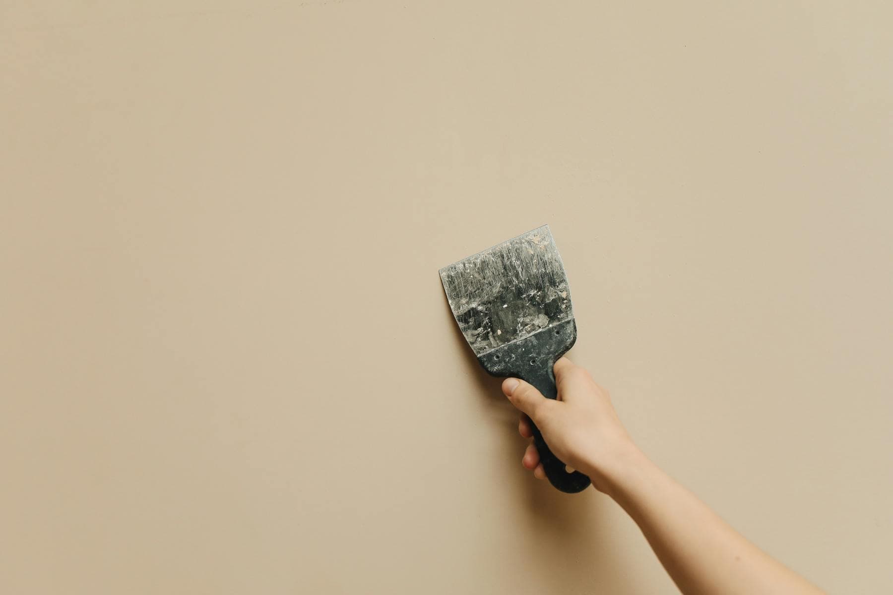 Finished drywall repair blended into an interior wall